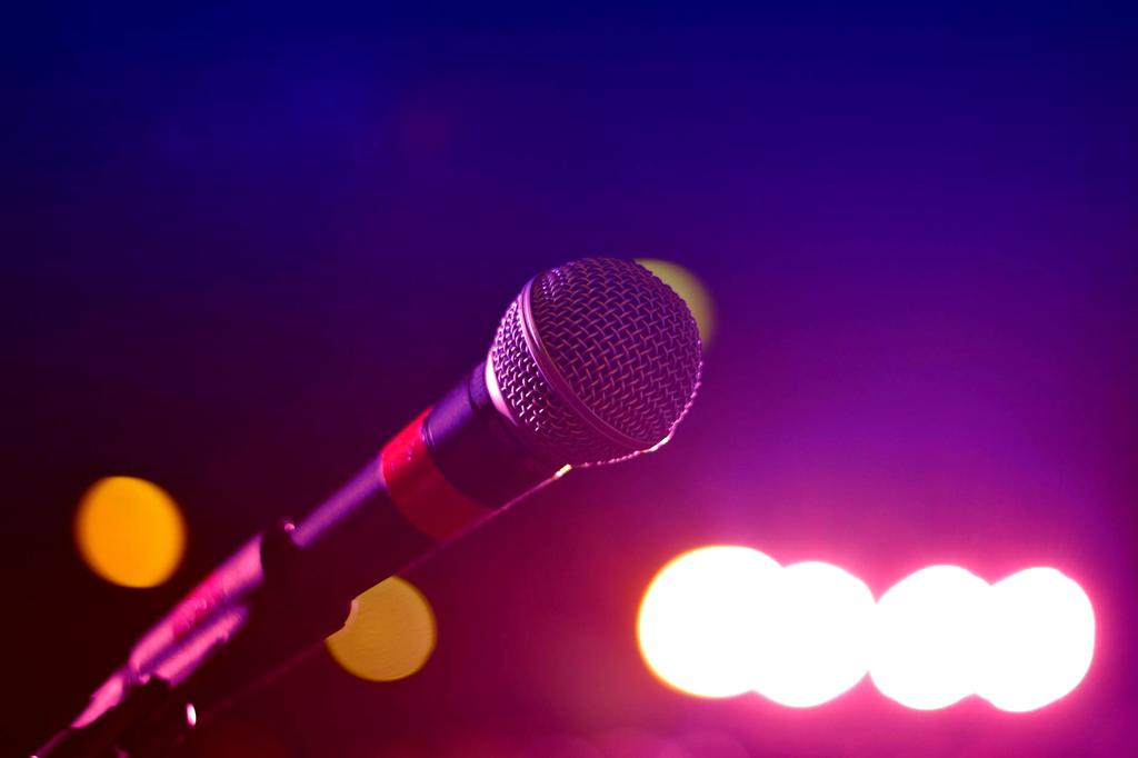 Microphone with soundwave illustration showing AI enhancement