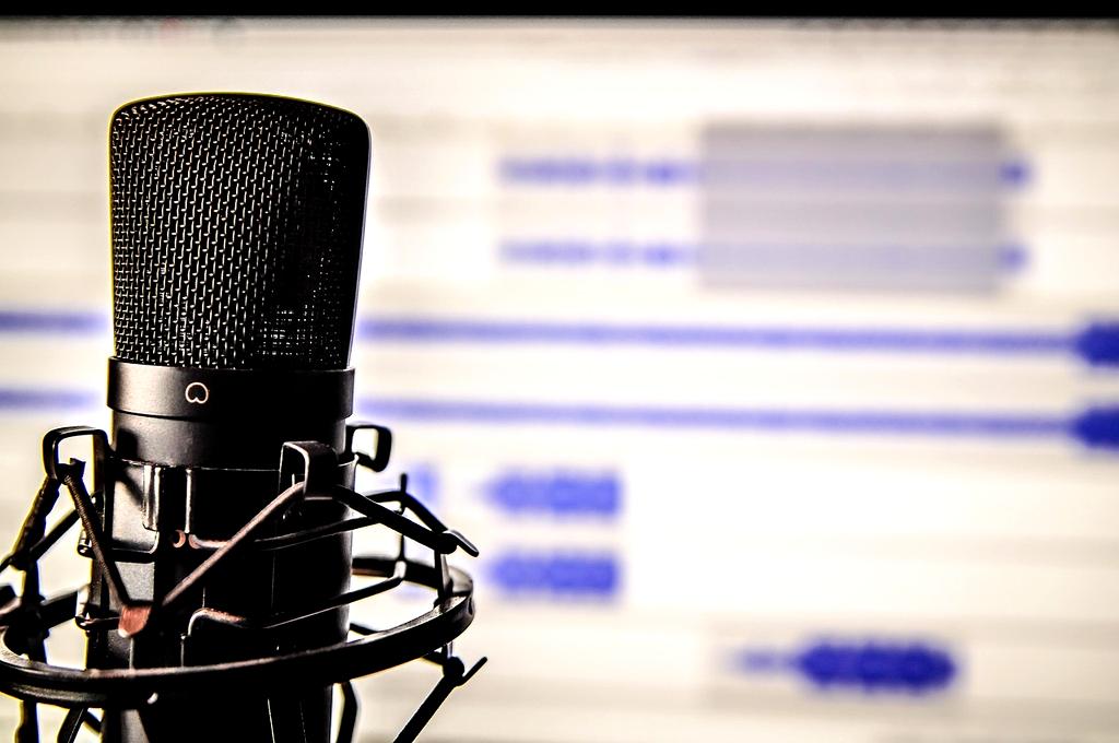 Professional business executive using AI voice enhancement for video conferencing
